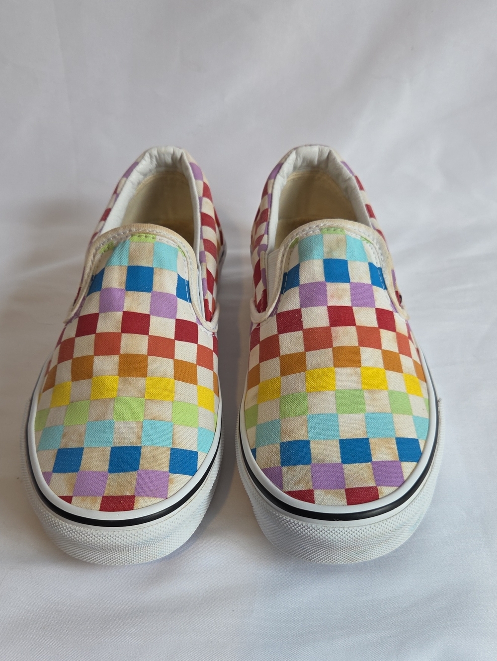 Vans Slip-On Sneakers in Rainbow Checkerboard